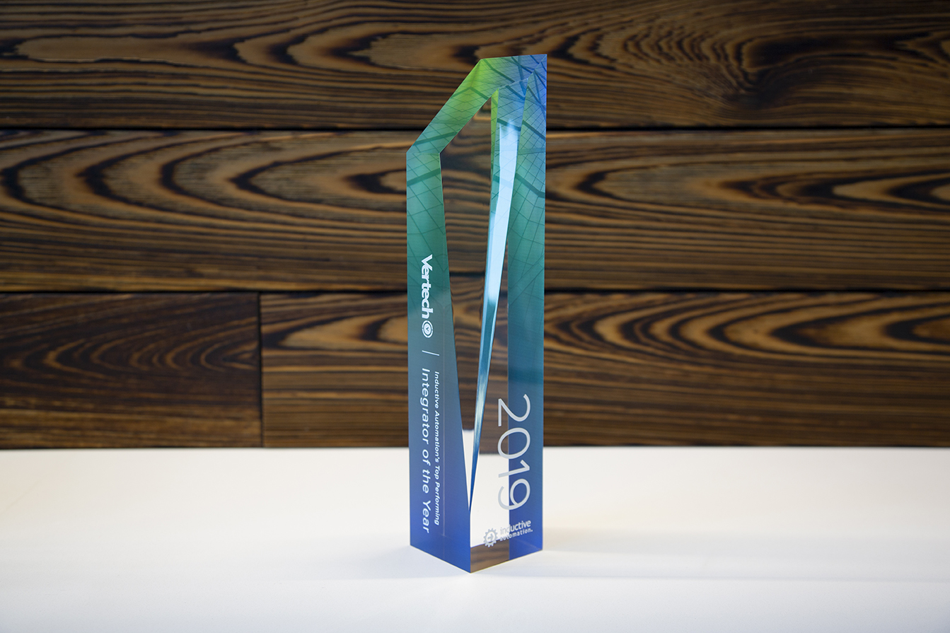 Tall rectangular glass award that reads Vertech, Integrator of the Year, 2019, Inductive Automation